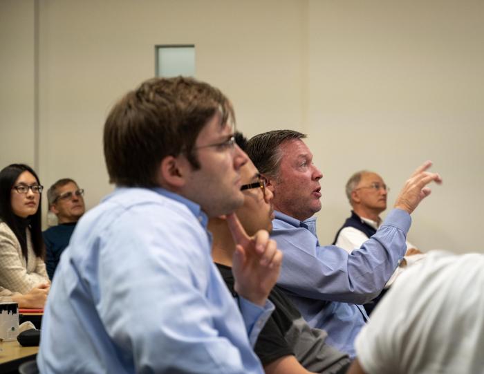 Mentor, Charles Zahl, engaged in conversation