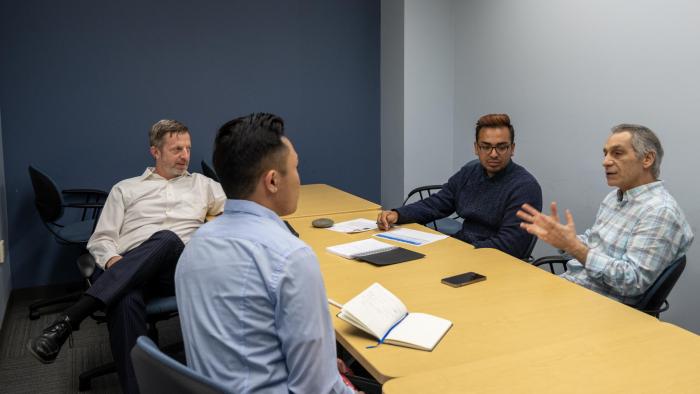 Eamen H. Mentor, talking with students